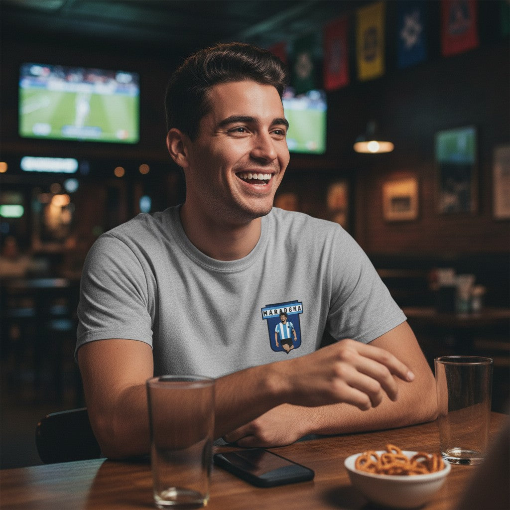 Globalfanz grey 100% cotton t-shirt with a Maradona crest graphic on the left chest.
