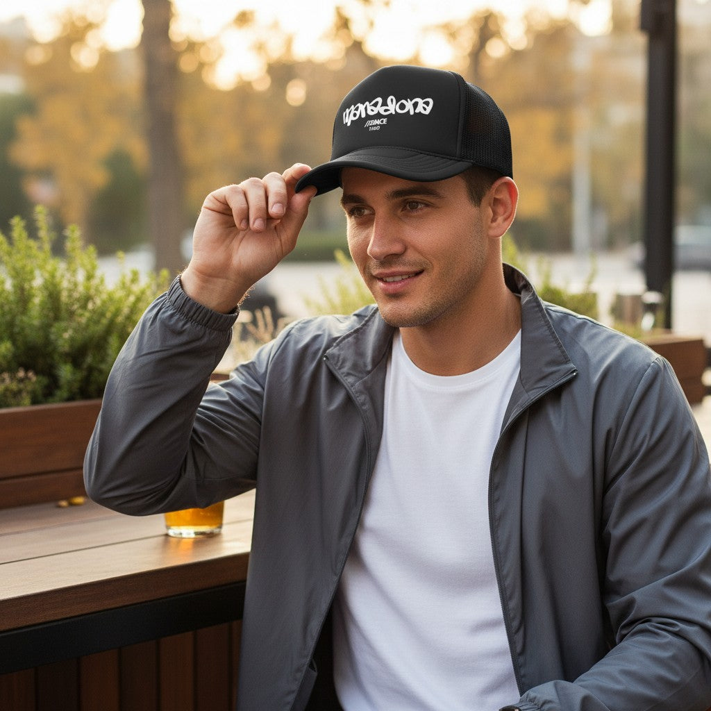 Globalfanz black foam trucker cap with white embroidered Maradona logo and "//SINCE 1960" text. Breathable mesh back and adjustable snap.